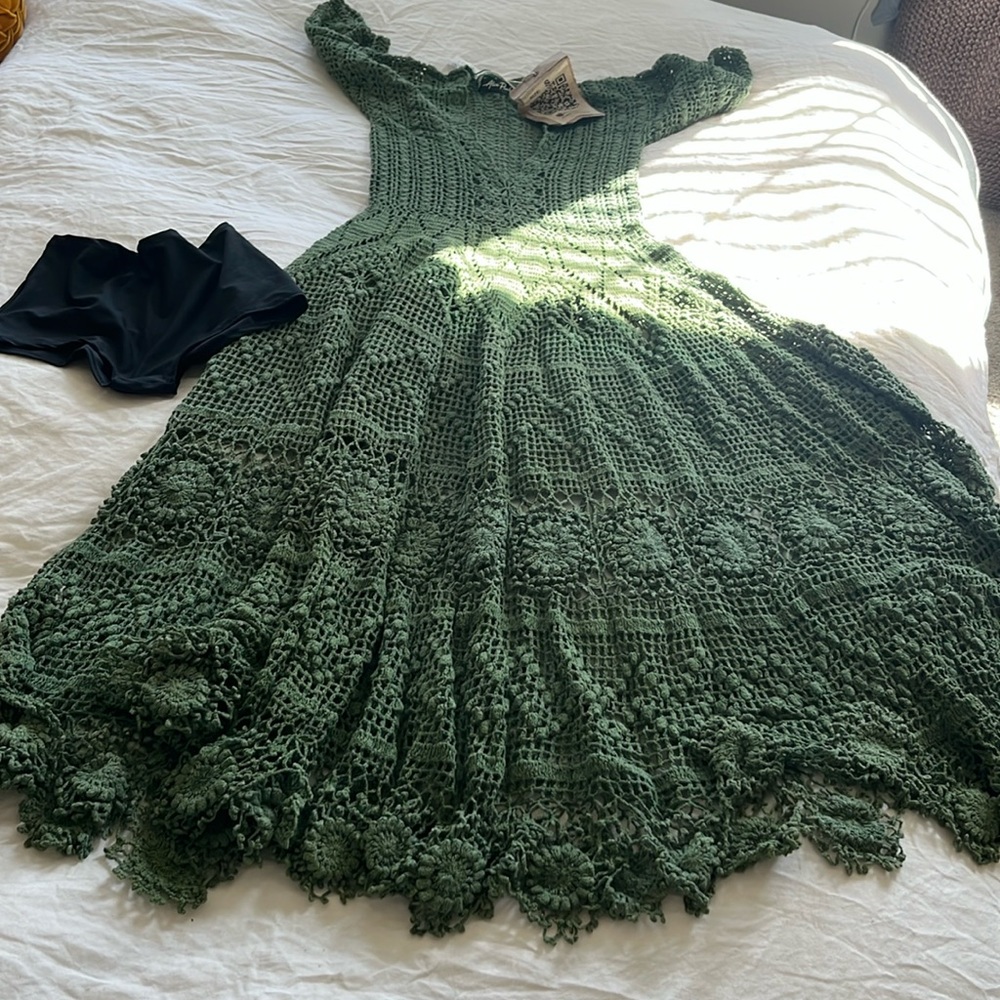 Hand made crochet dress with black short shorts. Very beautiful!